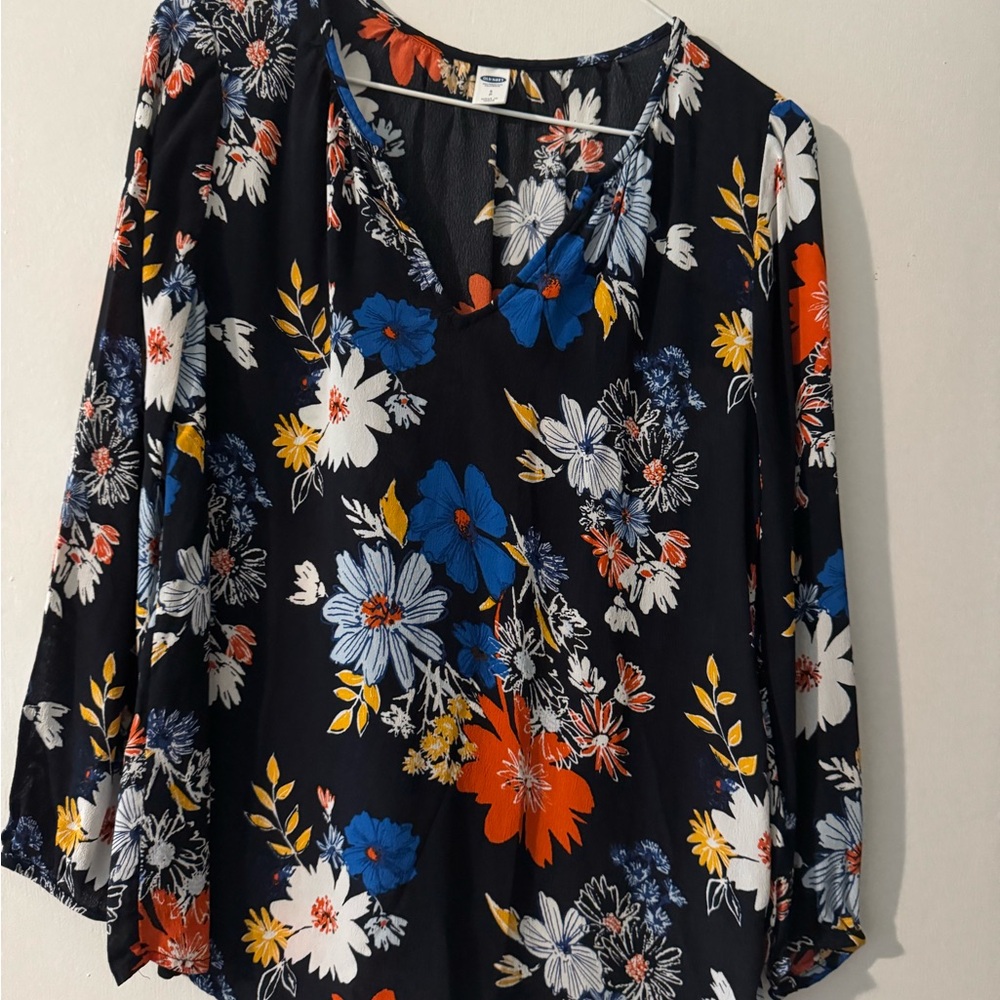 Old Navy Floral Print Blouse - Blue, Orange, White. Black background.